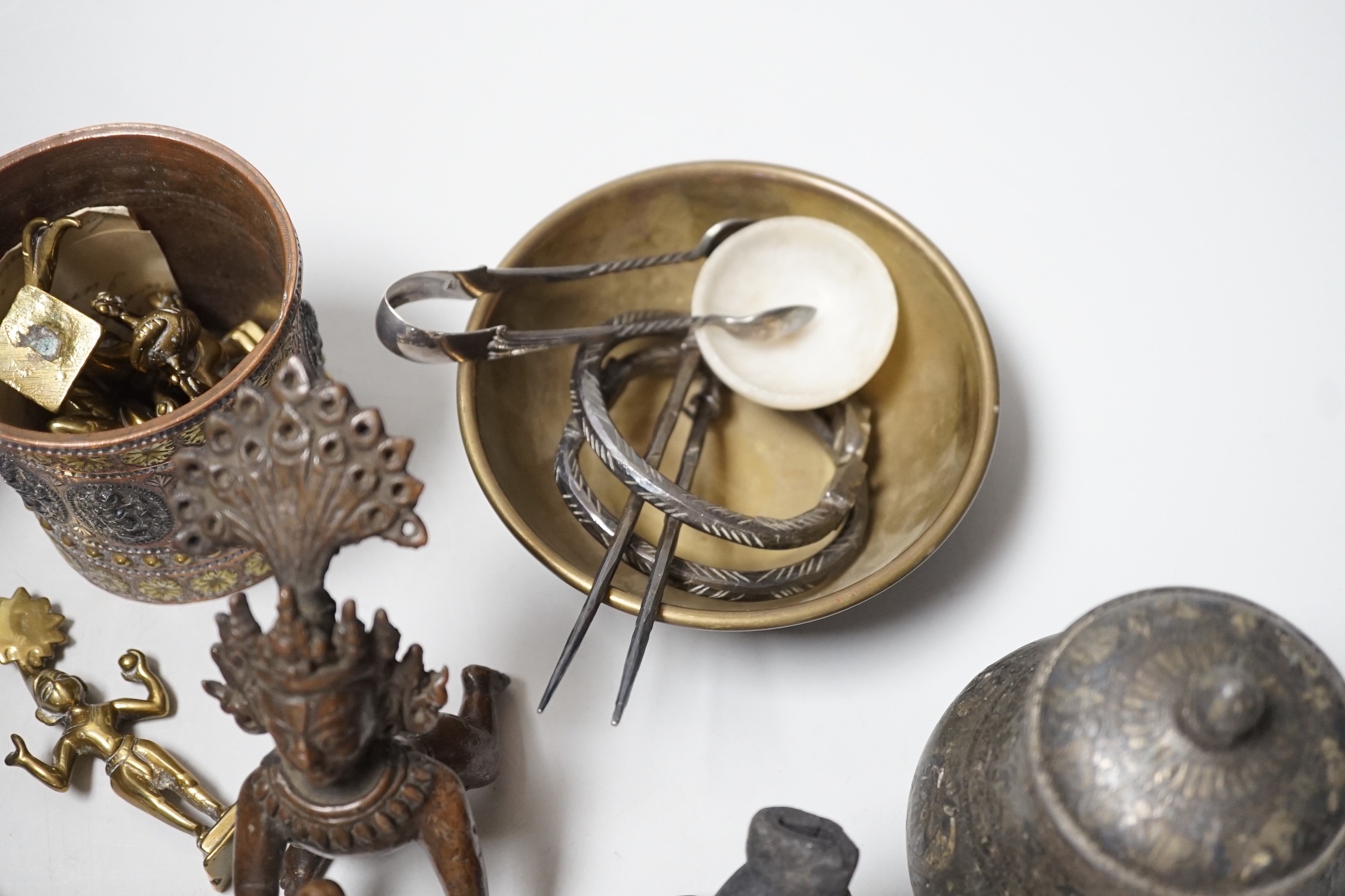 An Eastern white metal mounted dagger, a quantity of Eastern metalware and a white metal-mounted cup